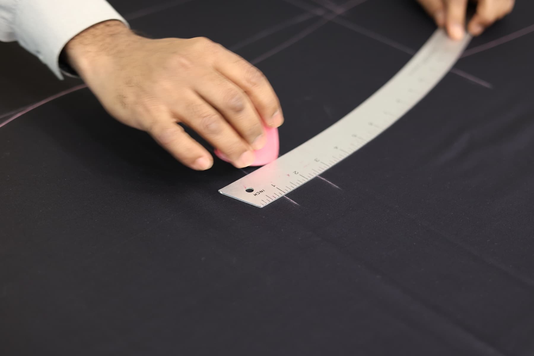 Hand-drawing the curve of the lapel on tissue