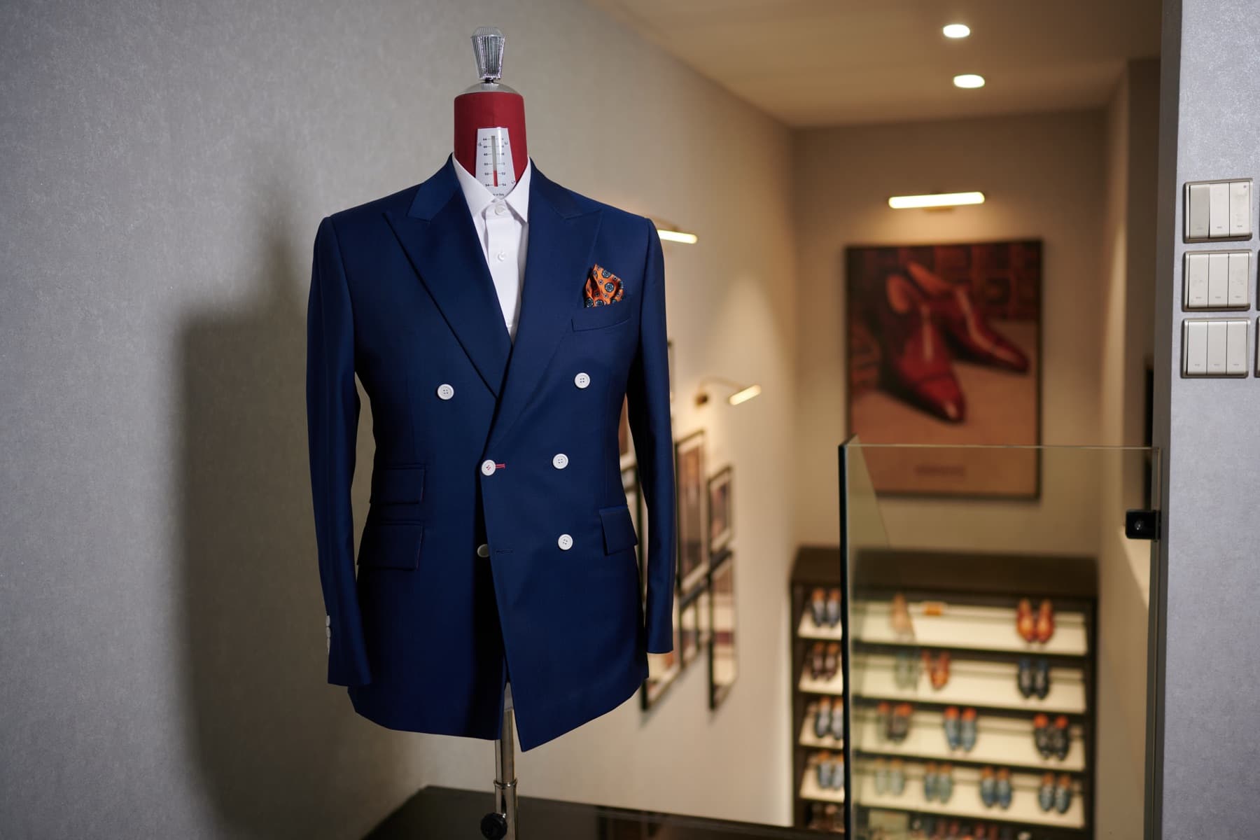 A bespoke double-breasted suit on the form at the Hilton atelier